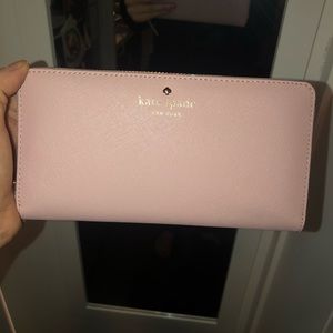 Kate Spade blush pink wallet. NEVER BEEN USED